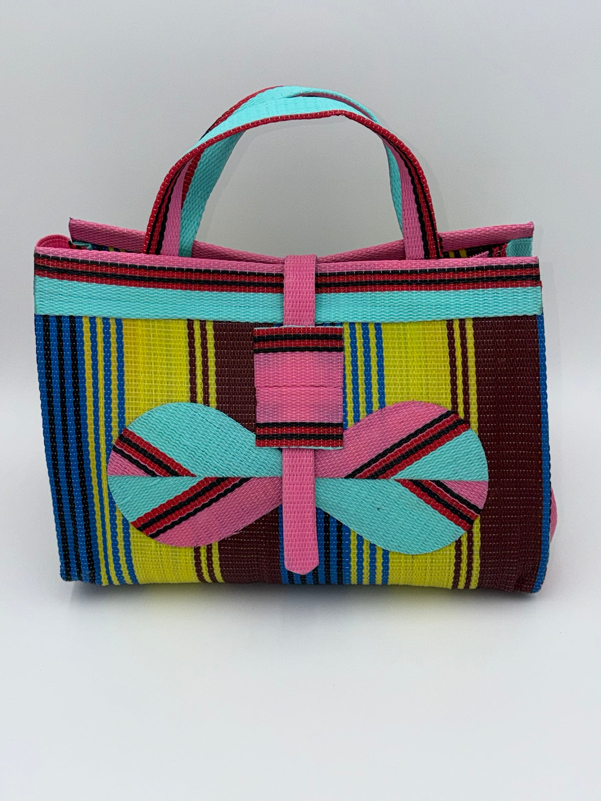 Sunshine Large handwoven tote bag by SCRUBIES in Pink,Teal,Yellow,Blue,Brown with Stripes design and Bow accent pattern
