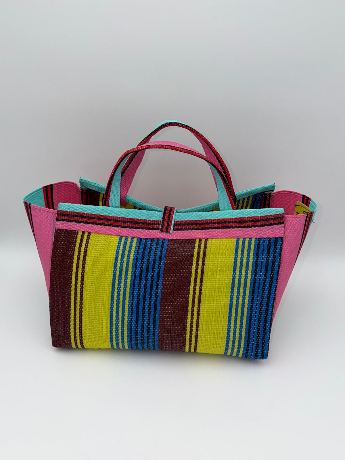 Sunshine Large handwoven tote bag by SCRUBIES in Pink,Teal,Blue,Yellow,Brown with Stripes design and Leaf accent pattern