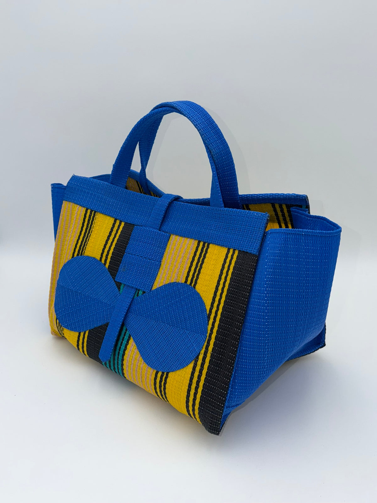 Lagoon Large handwoven tote bag by SCRUBIES in Blue,Yellow,Black,Green with Stripes design and Bow accent pattern
