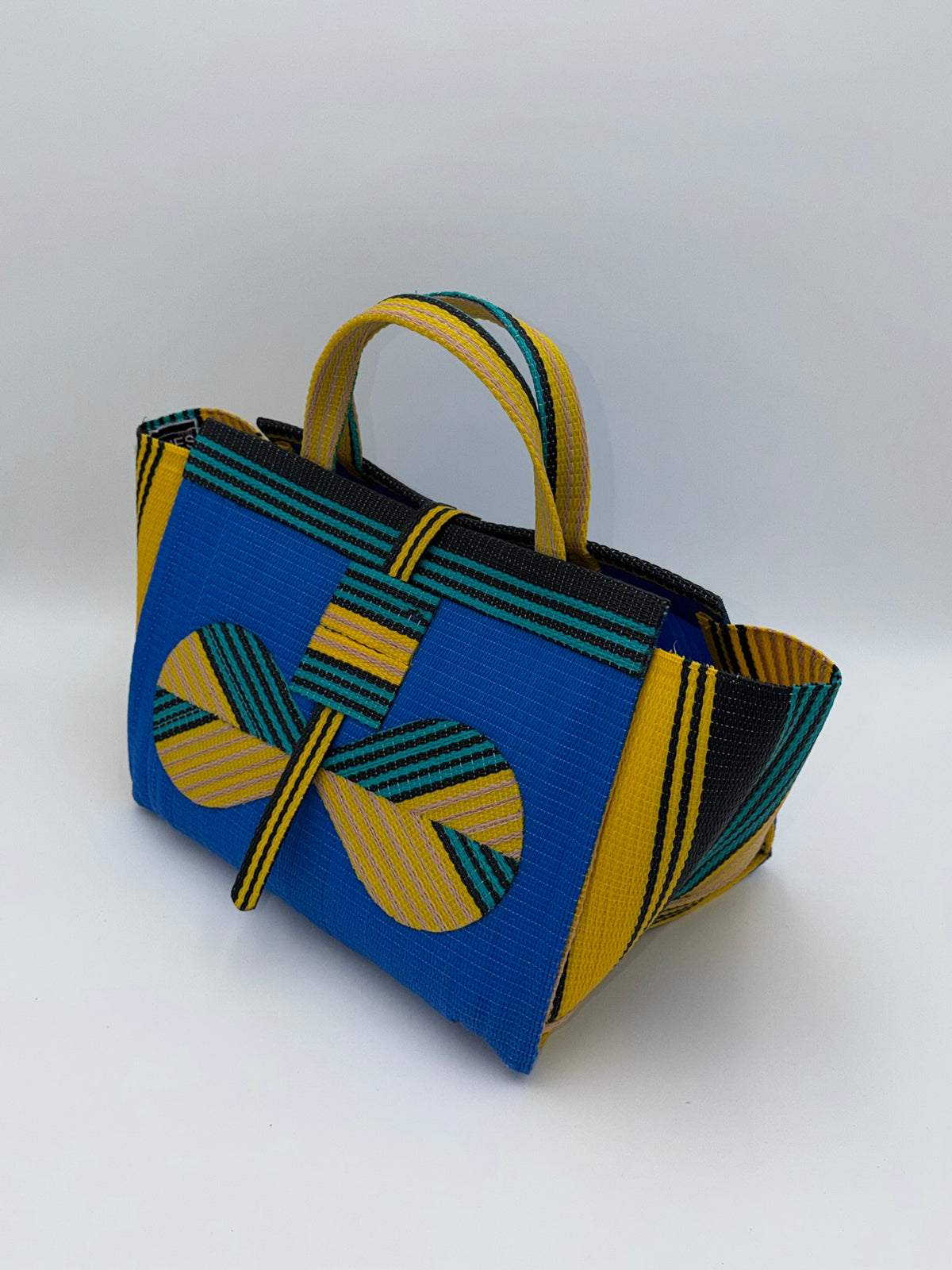 Lagoon Large handwoven tote bag by SCRUBIES in Blue,Yellow,Black,Green with Solid design and Bow accent pattern