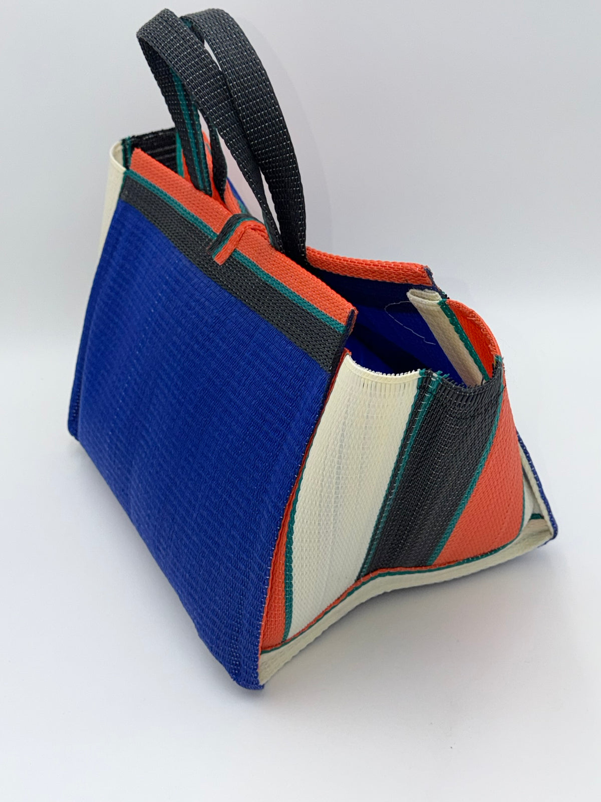 Berry Large handwoven tote bag by SCRUBIES in Blue,Orange,Cream,Black with Solid design and Bow accent pattern