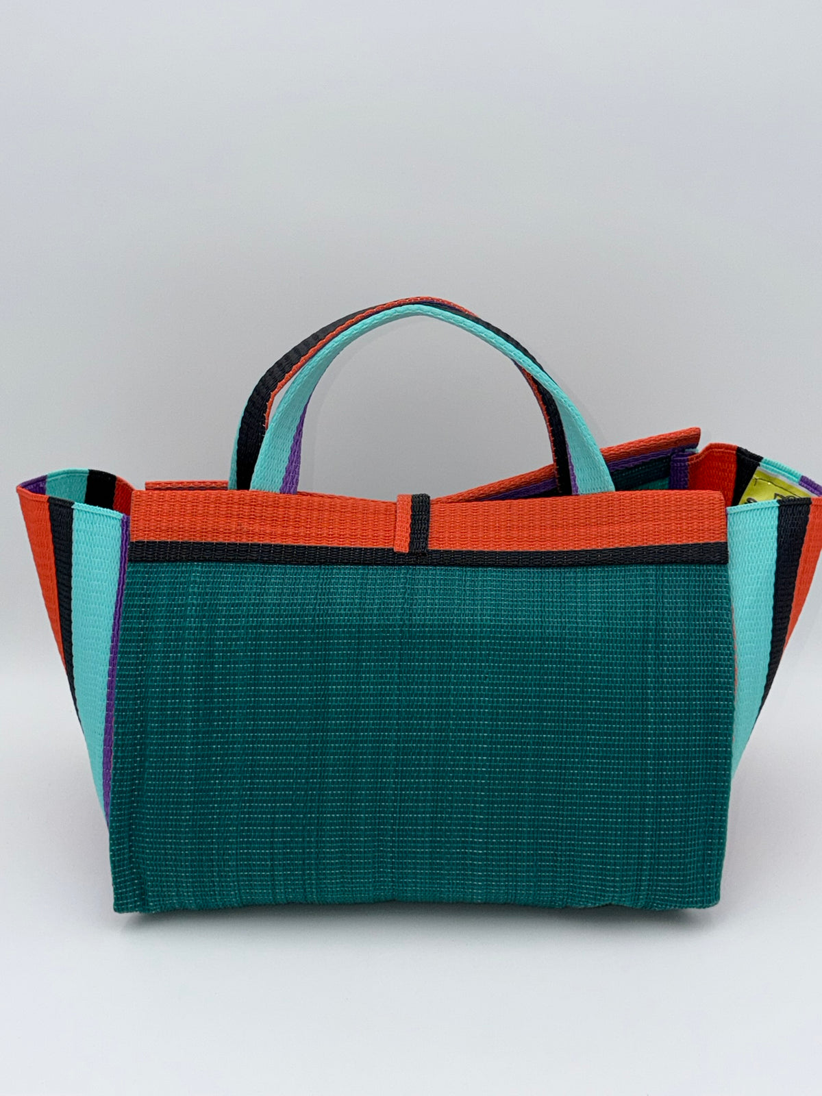 Emerald Large handwoven tote bag by SCRUBIES in Green,Orange,Black,Teal,Purple with Solid design and Leaf accent pattern