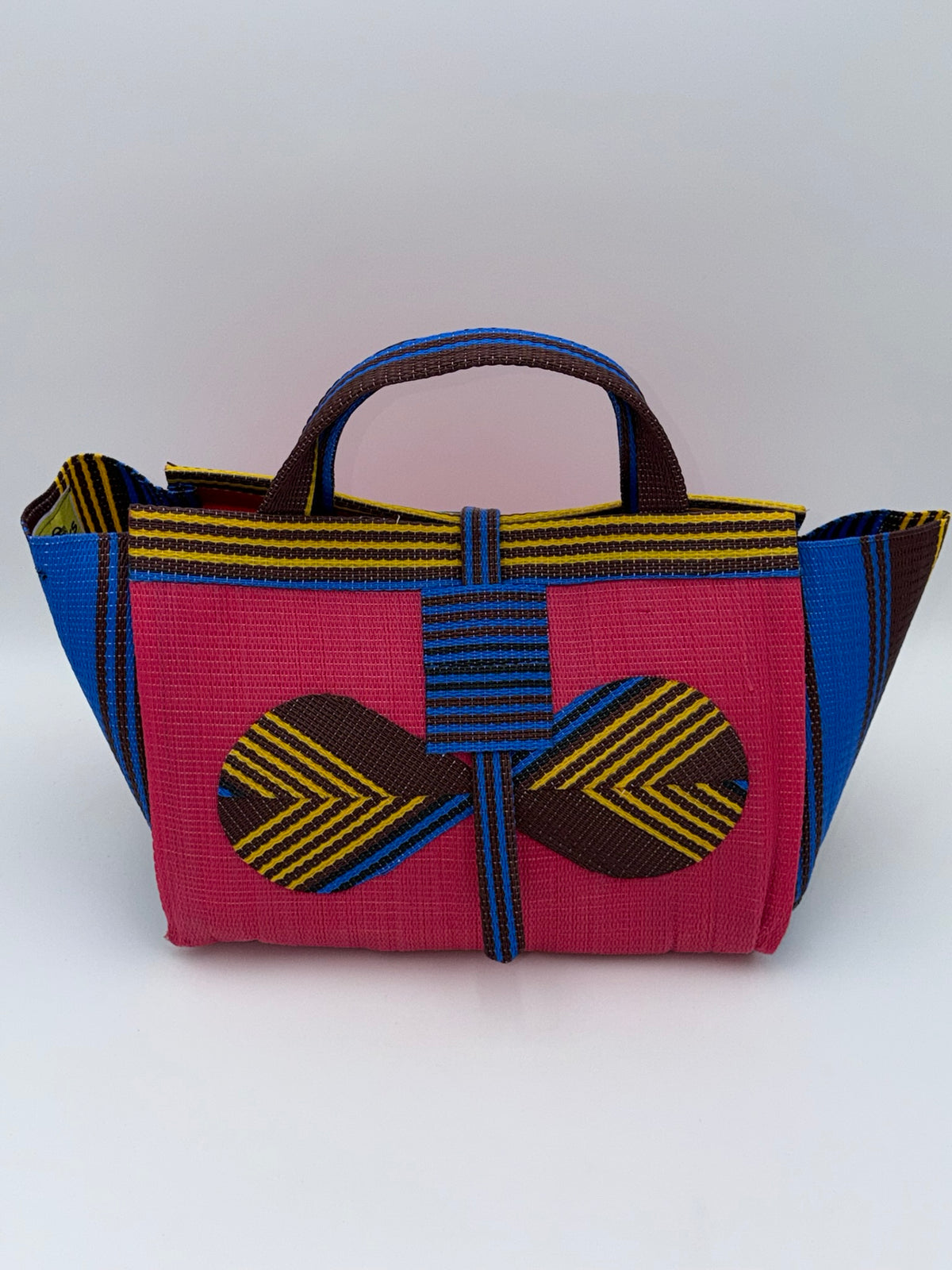 Candy Large handwoven tote bag by SCRUBIES in Pink,Blue,Brown,Yellow with Solid design and Bow accent pattern
