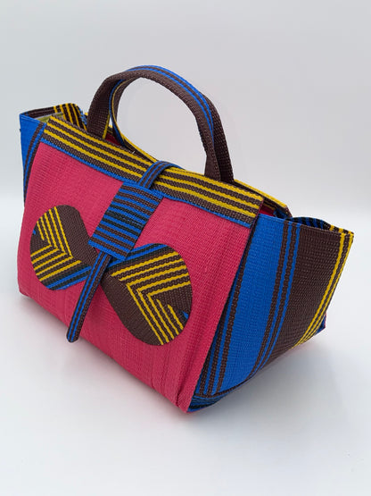 Candy Large handwoven tote bag by SCRUBIES in Pink,Blue,Brown,Yellow with Solid design and Bow accent pattern