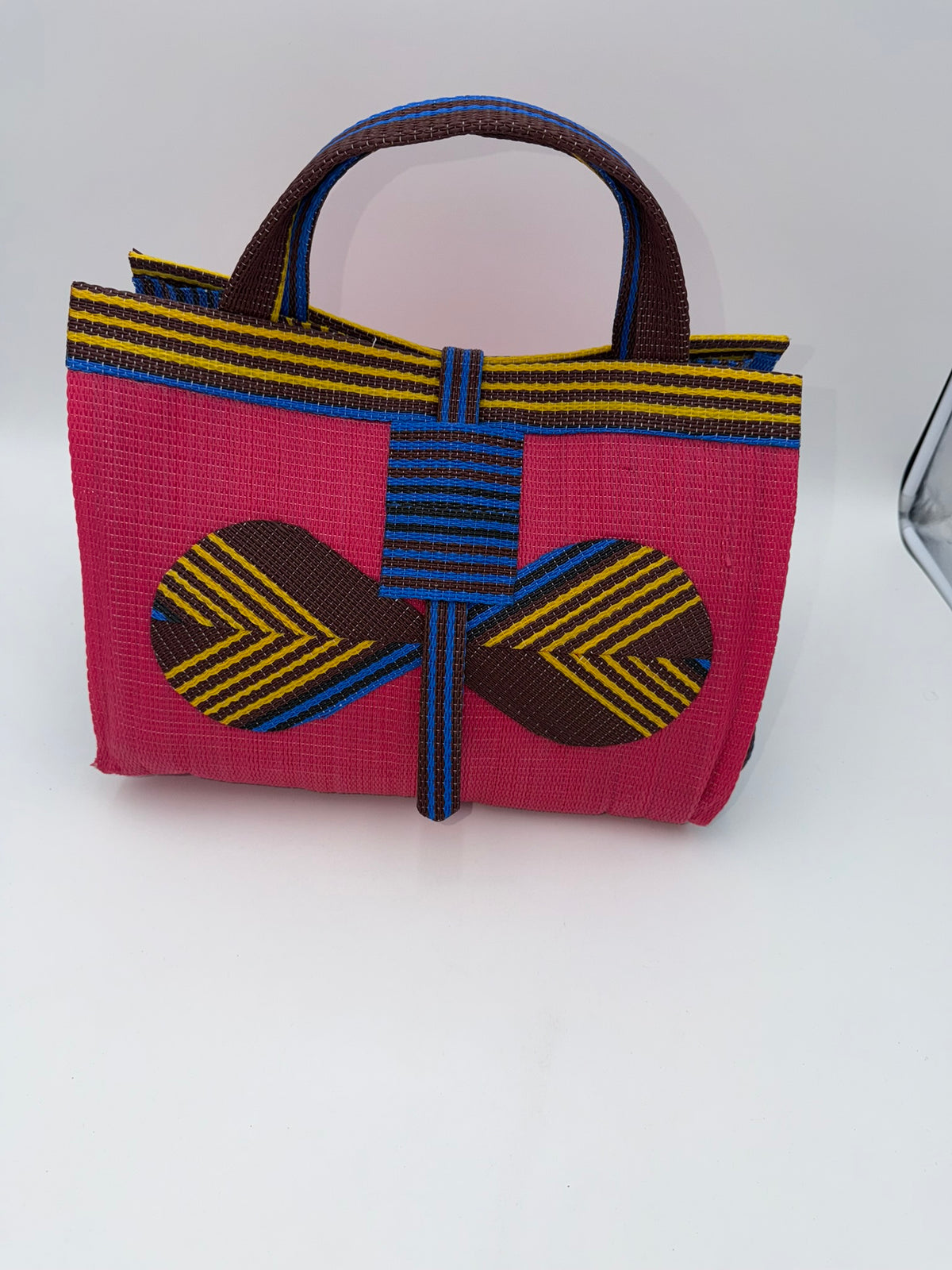Candy Large handwoven tote bag by SCRUBIES in Pink,Blue,Brown,Yellow with Solid design and Bow accent pattern