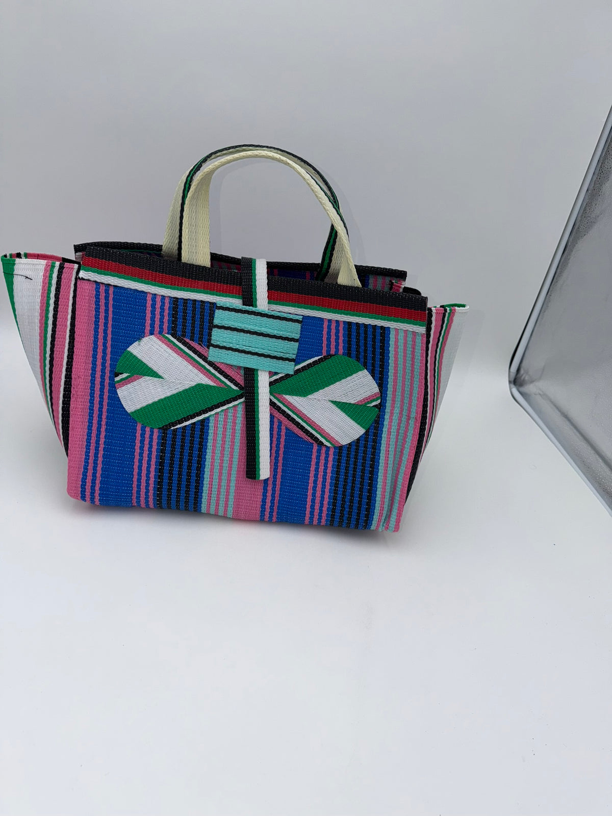 Candy Large handwoven tote bag by SCRUBIES in Pink,Blue,Brown,Yellow with Solid design and Bow accent pattern