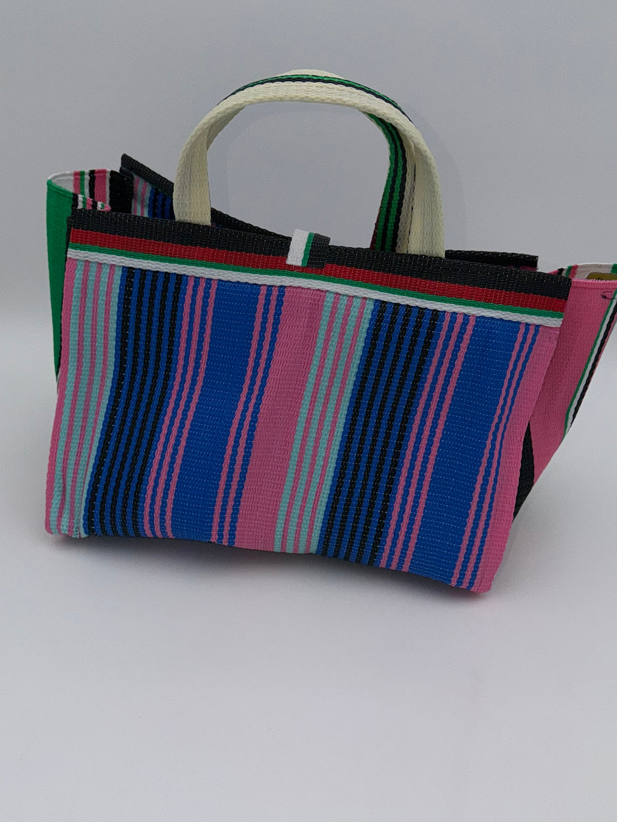 Candy Large handwoven tote bag by SCRUBIES in Pink,Blue,Brown,Yellow with Solid design and Bow accent pattern