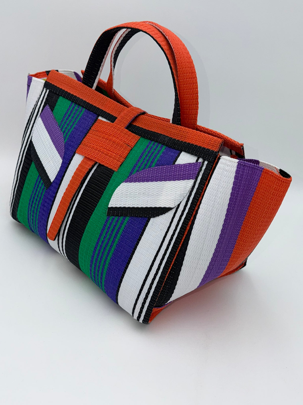 Emerald Large handwoven tote bag by SCRUBIES in Orange,Black,White,Purple,Green with Stripes design and Leaf accent pattern