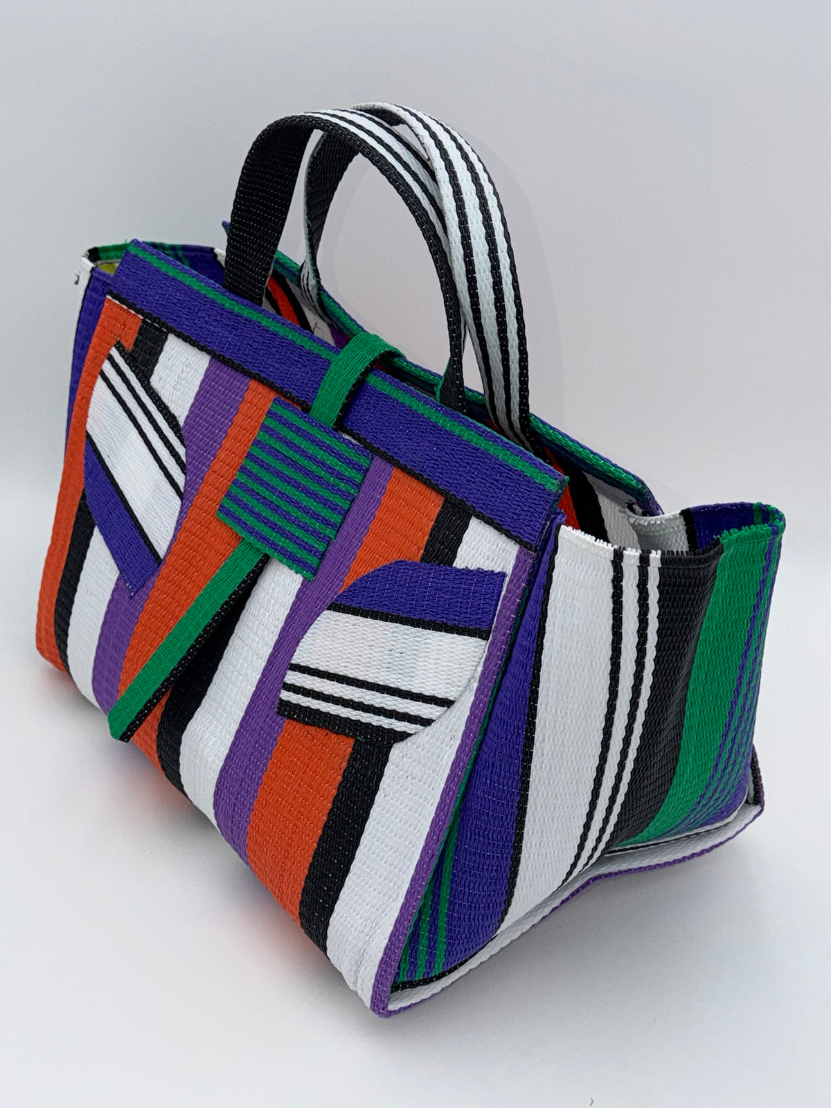 Orange Blocks Large handwoven tote bag by SCRUBIES in Orange,Black,White,Purple,Green with Block design and Leaf accent pattern