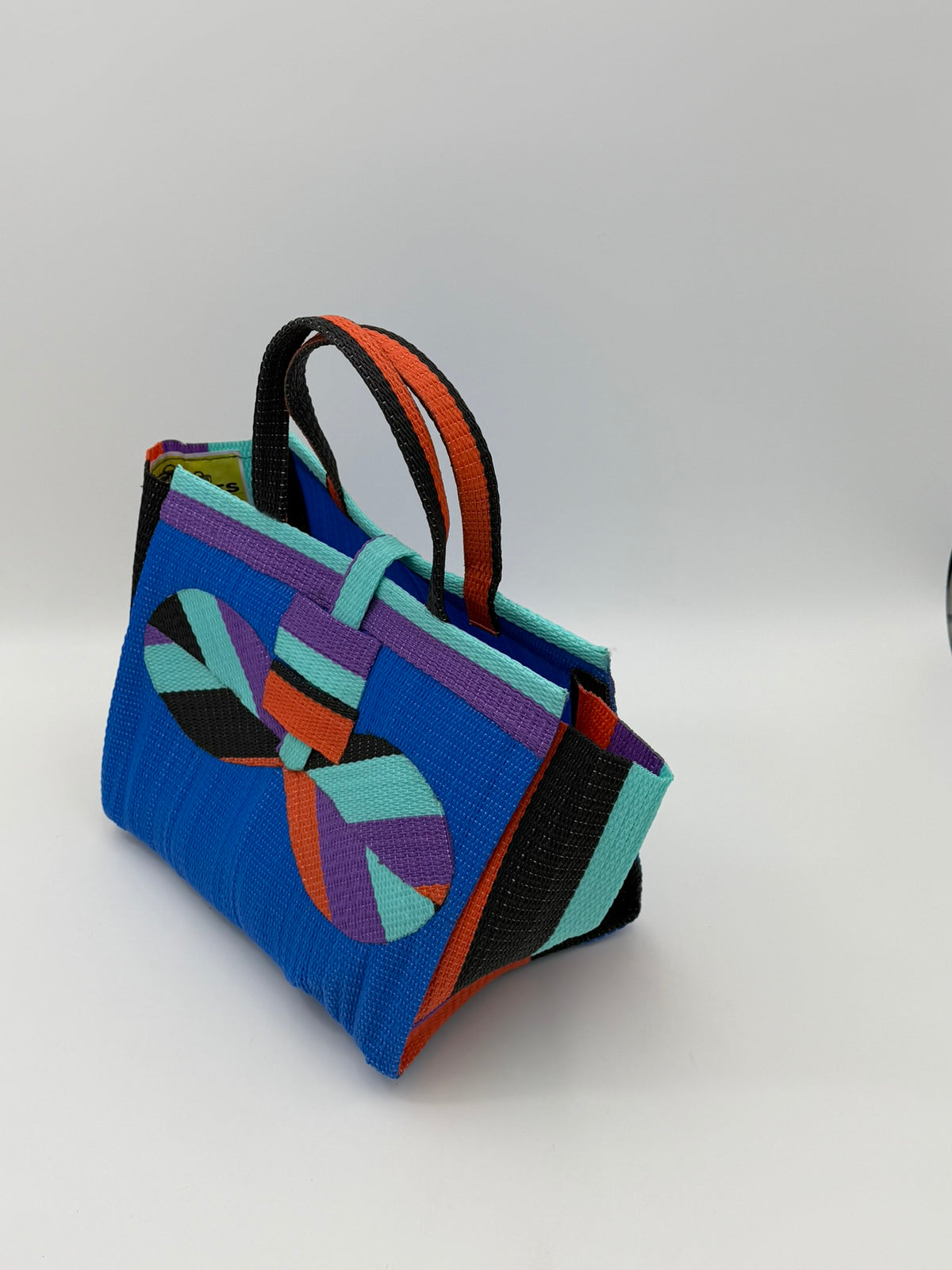 Lagoon Medium  handwoven tote bag by SCRUBIES in Blue,Purple,Teal,Orange with Solid design and Bow accent pattern