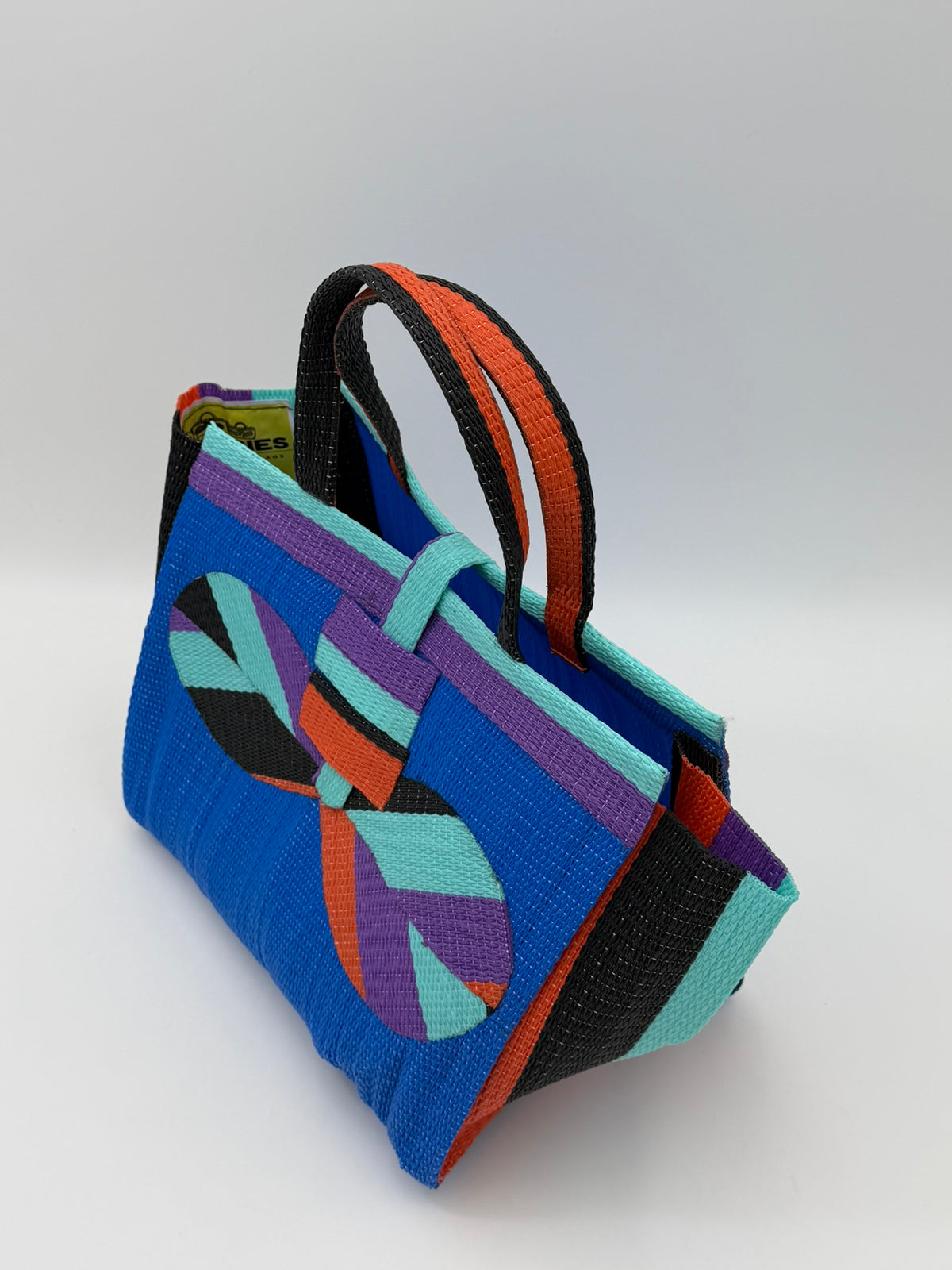 Lagoon Medium  handwoven tote bag by SCRUBIES in Blue,Purple,Teal,Orange with Solid design and Bow accent pattern