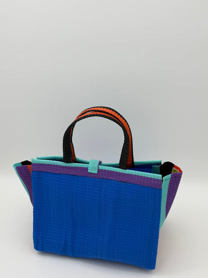 Lagoon Medium  handwoven tote bag by SCRUBIES in Blue,Purple,Teal,Orange with Solid design and Bow accent pattern