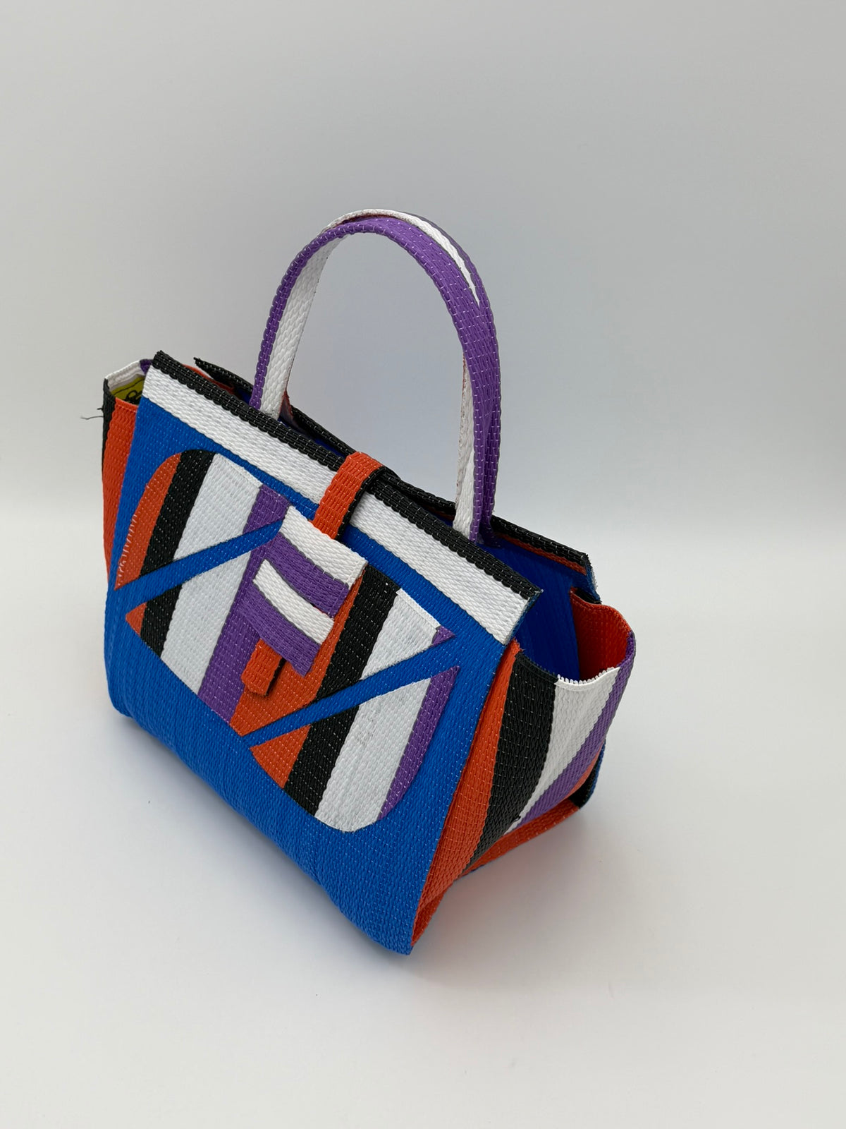Lagoon Medium  handwoven tote bag by SCRUBIES in Blue,Orrange,White,Black,Purple with Solid design and Abstract accent pattern