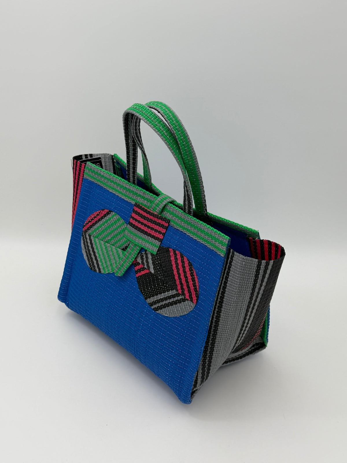 Lagoon Medium  handwoven tote bag by SCRUBIES in Blue,Pink,Green,Black, with Solid design and Bow  accent pattern