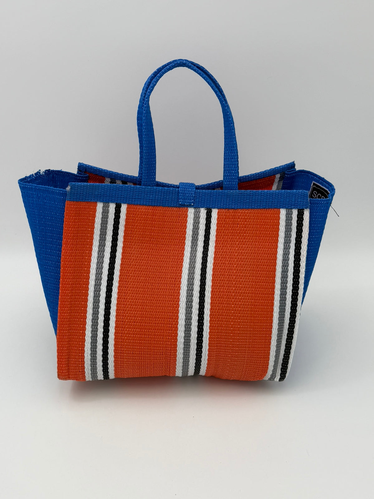 Citrus Medium  handwoven tote bag by SCRUBIES in Orange,Blue,White,Gray with Stripes design and Bow accent pattern
