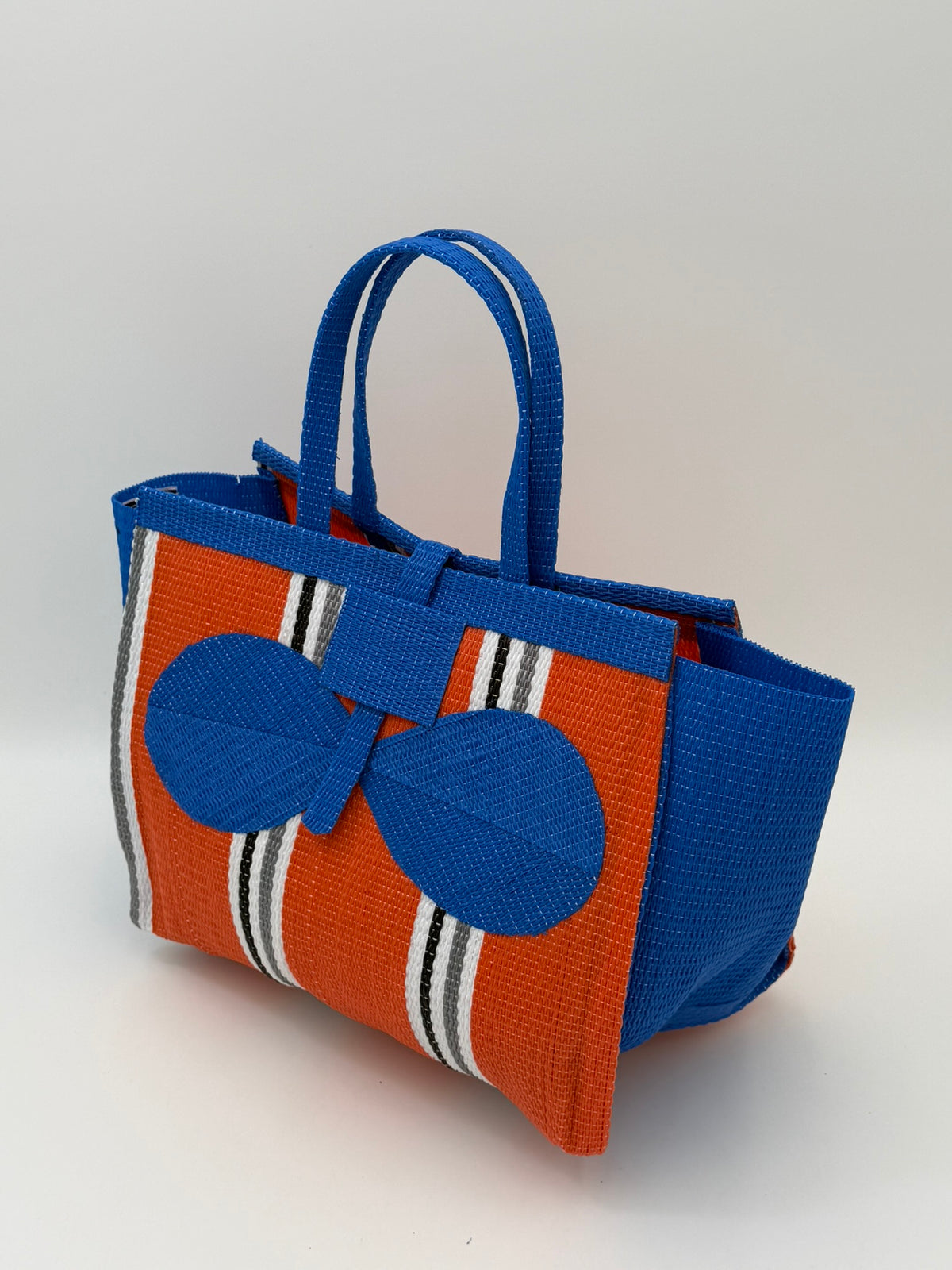Citrus Medium  handwoven tote bag by SCRUBIES in Orange,Blue,White,Gray with Stripes design and Bow accent pattern