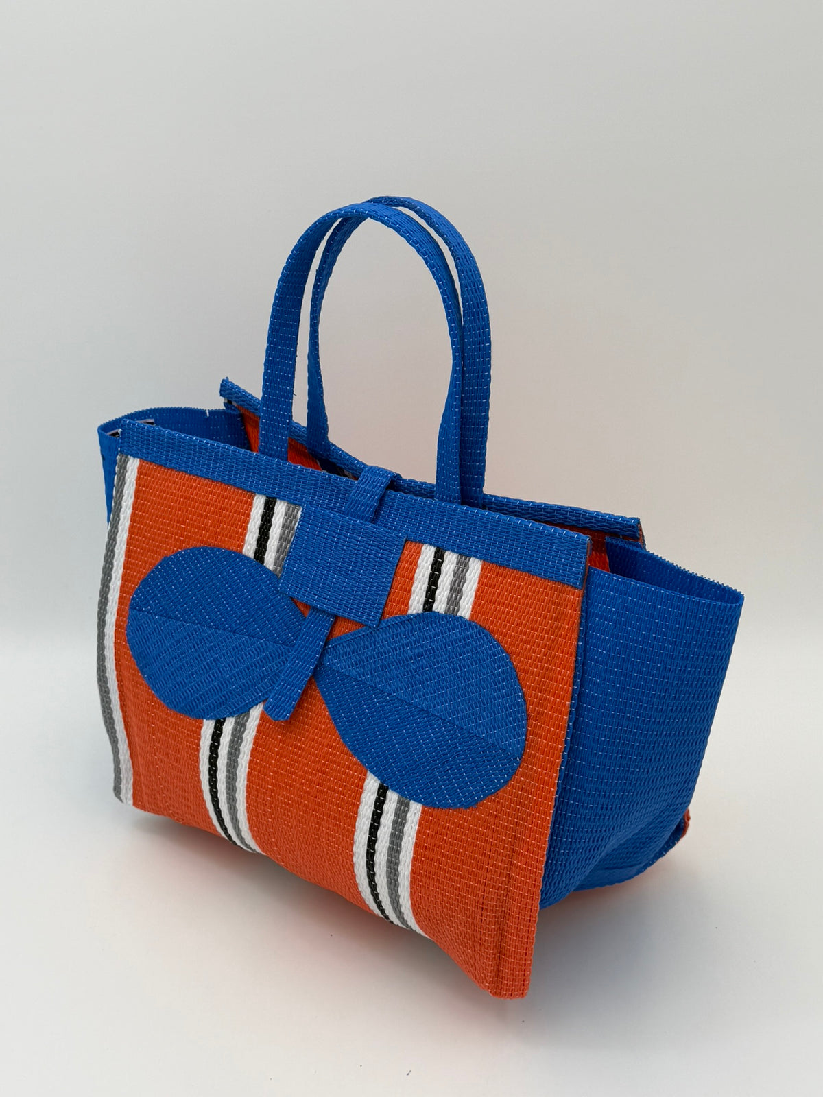 Citrus Medium  handwoven tote bag by SCRUBIES in Orange,Blue,White,Gray with Stripes design and Bow accent pattern