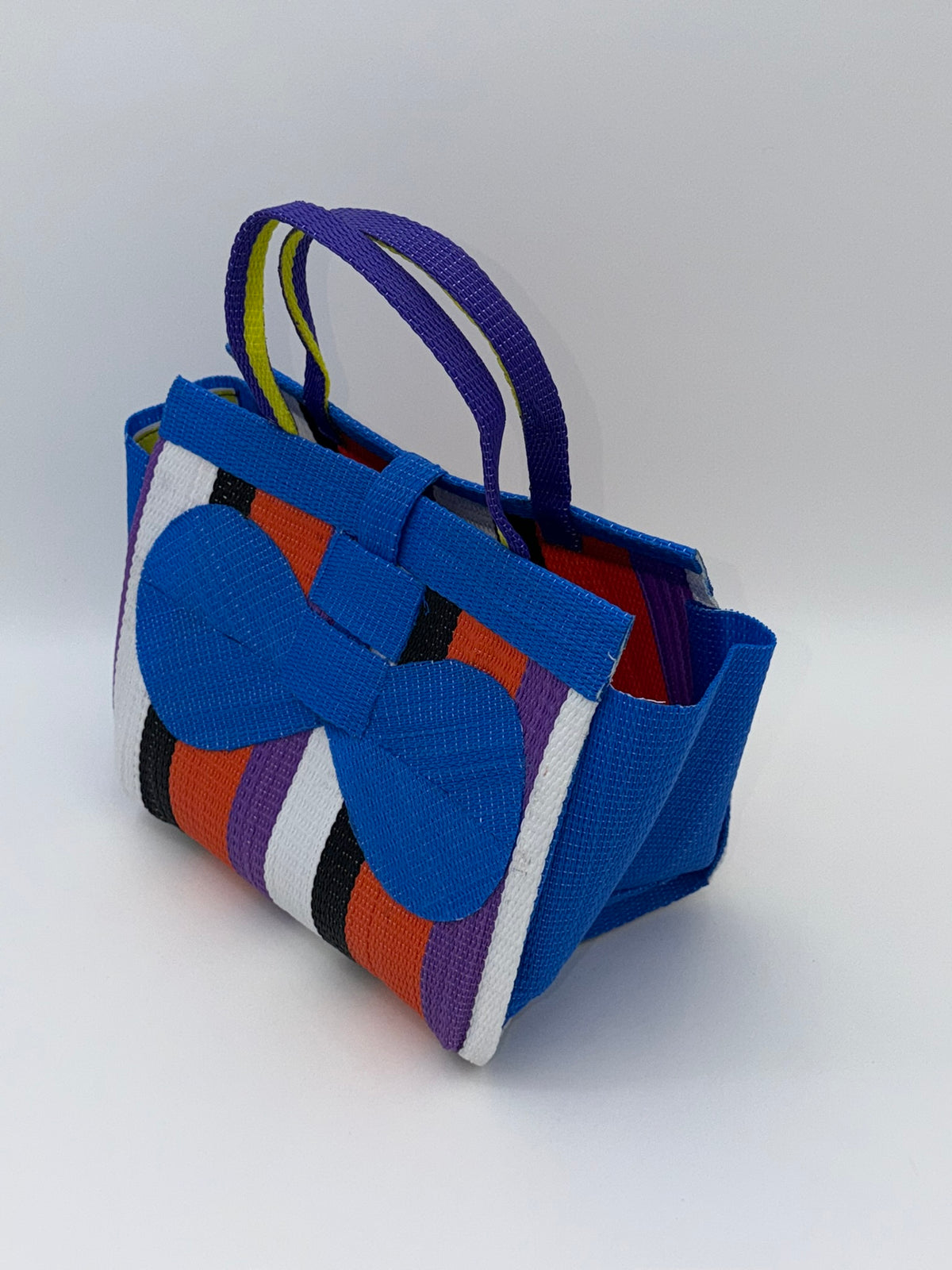 Citrus Medium  handwoven tote bag by SCRUBIES in Blue,White,Black,Orange,Purple with Stripes design and Bow accent pattern