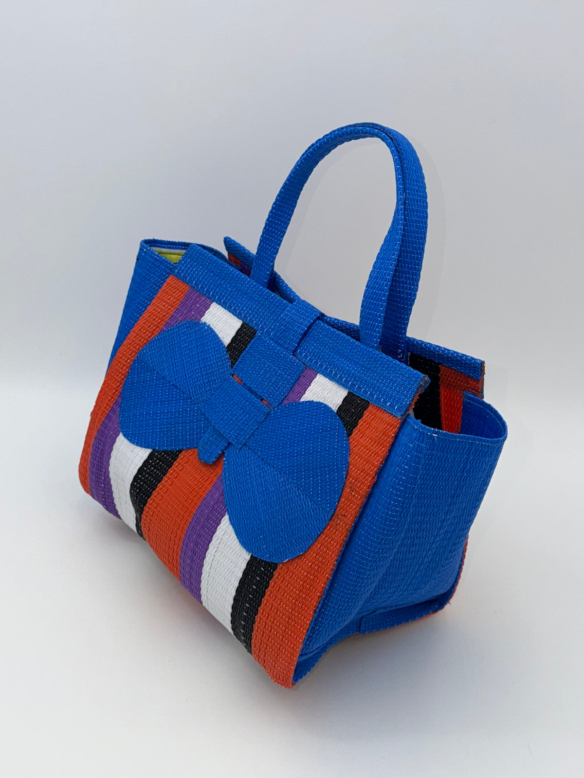 Citrus Medium  handwoven tote bag by SCRUBIES in Blue,White,Black,Orange,Purple with Block design and Bow accent pattern