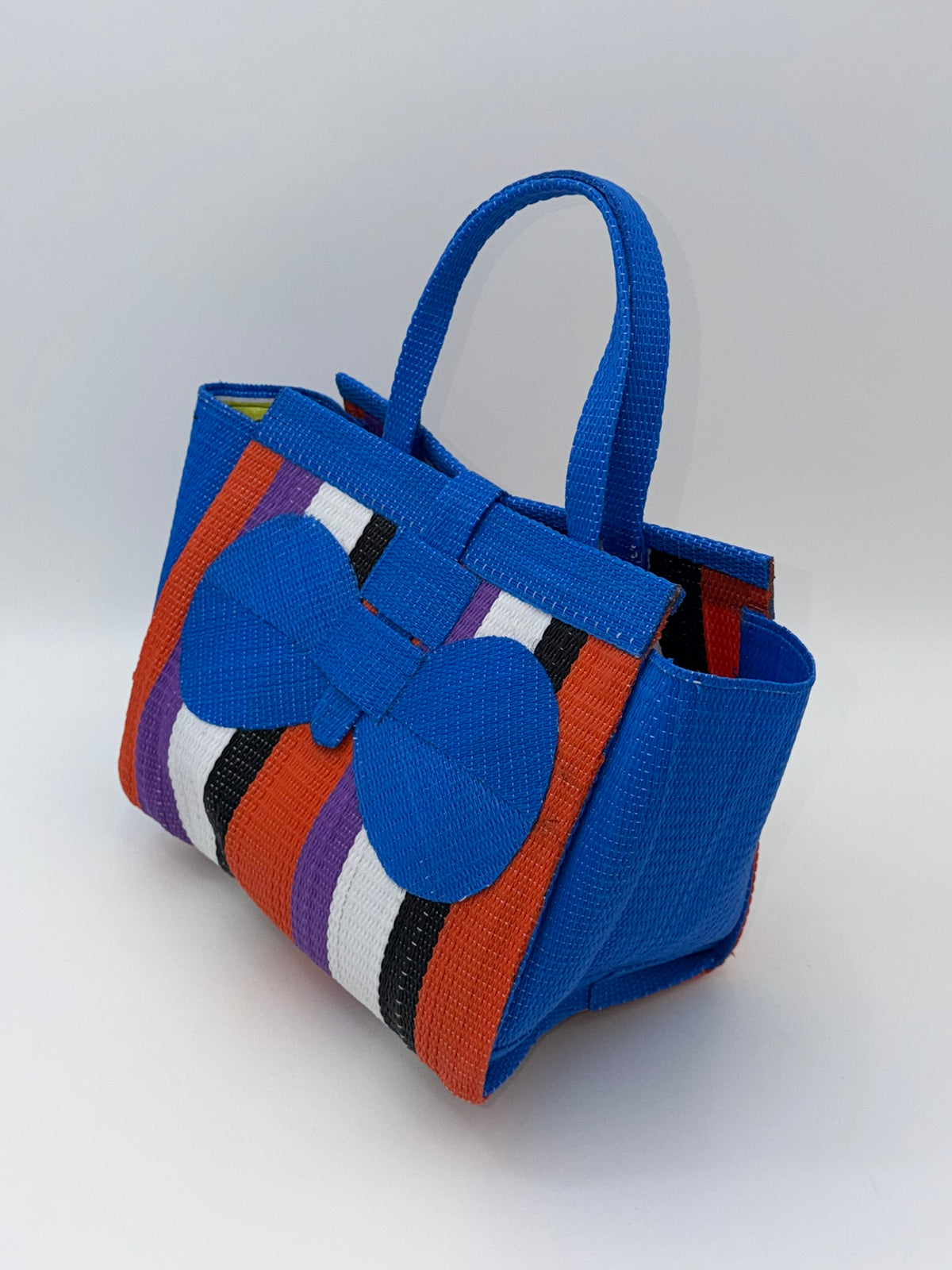 Citrus Medium  handwoven tote bag by SCRUBIES in Blue,White,Black,Orange,Purple with Block design and Bow accent pattern