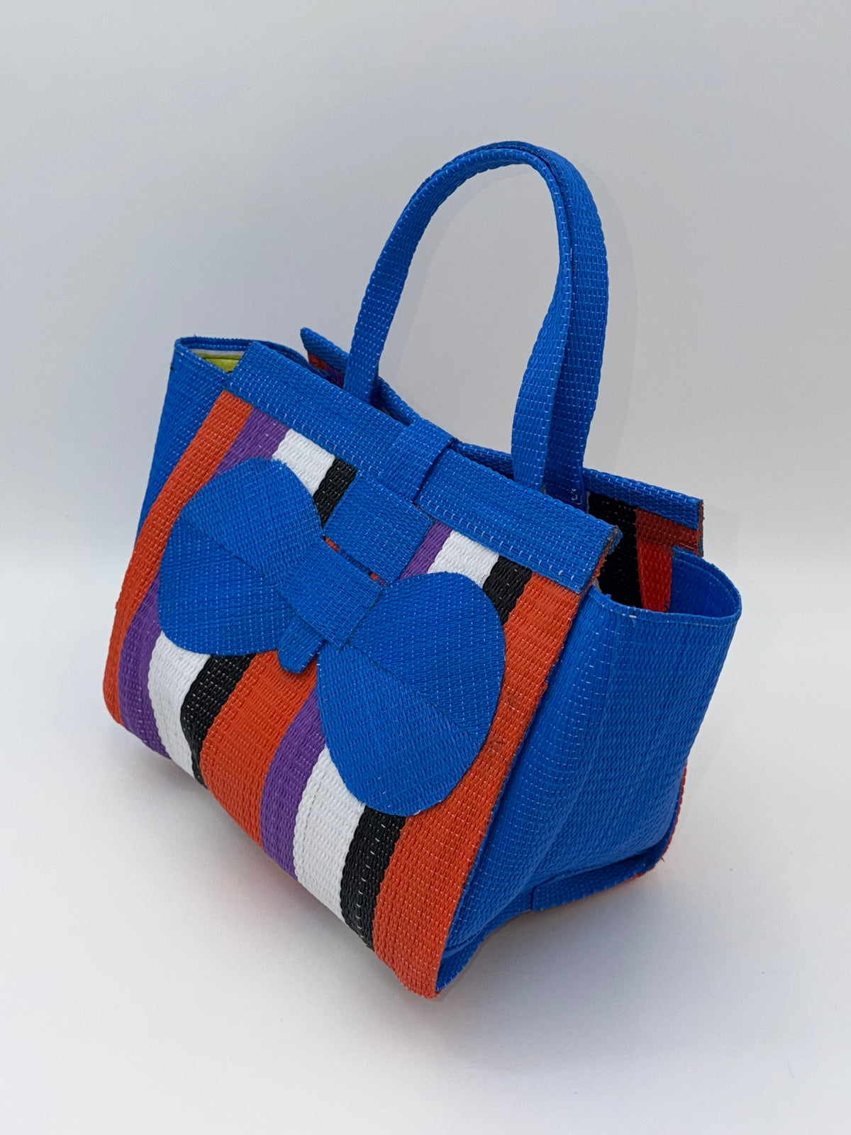 Citrus Medium  handwoven tote bag by SCRUBIES in Blue,White,Black,Orange,Purple with Block design and Bow accent pattern