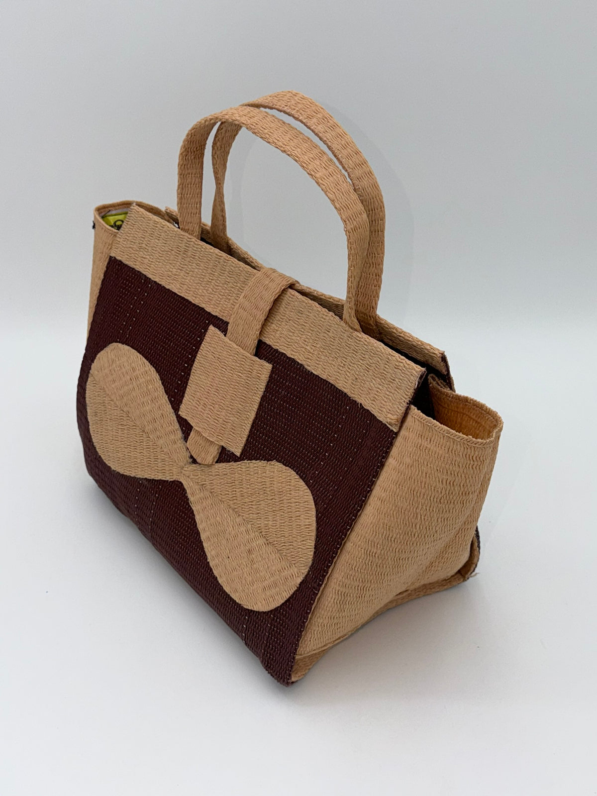 Chocolate Medium  handwoven tote bag by SCRUBIES in Chocolate,Beige with Solid design and Bow accent pattern