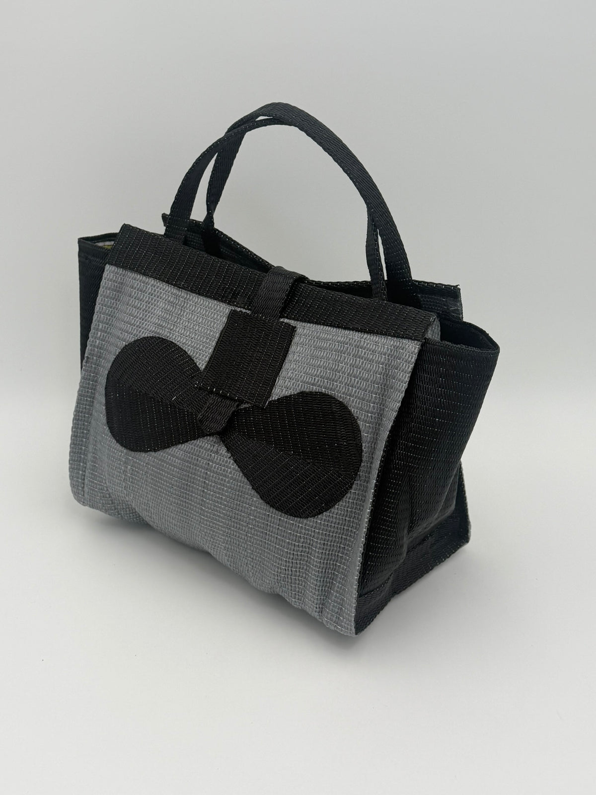 Silver Medium  handwoven tote bag by SCRUBIES in Gray,Black with Solid design and Bow accent pattern
