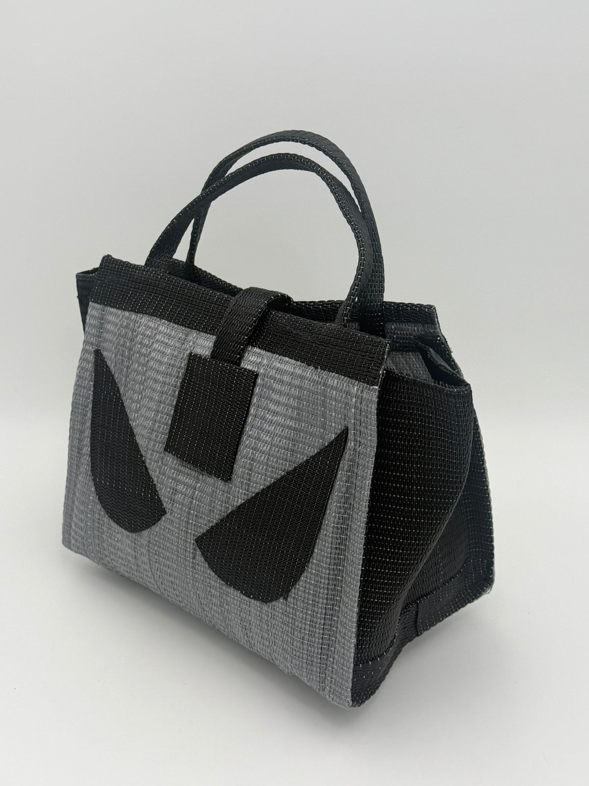Silver Medium  handwoven tote bag by SCRUBIES in Gray,Black with Solid design and Leaf accent pattern