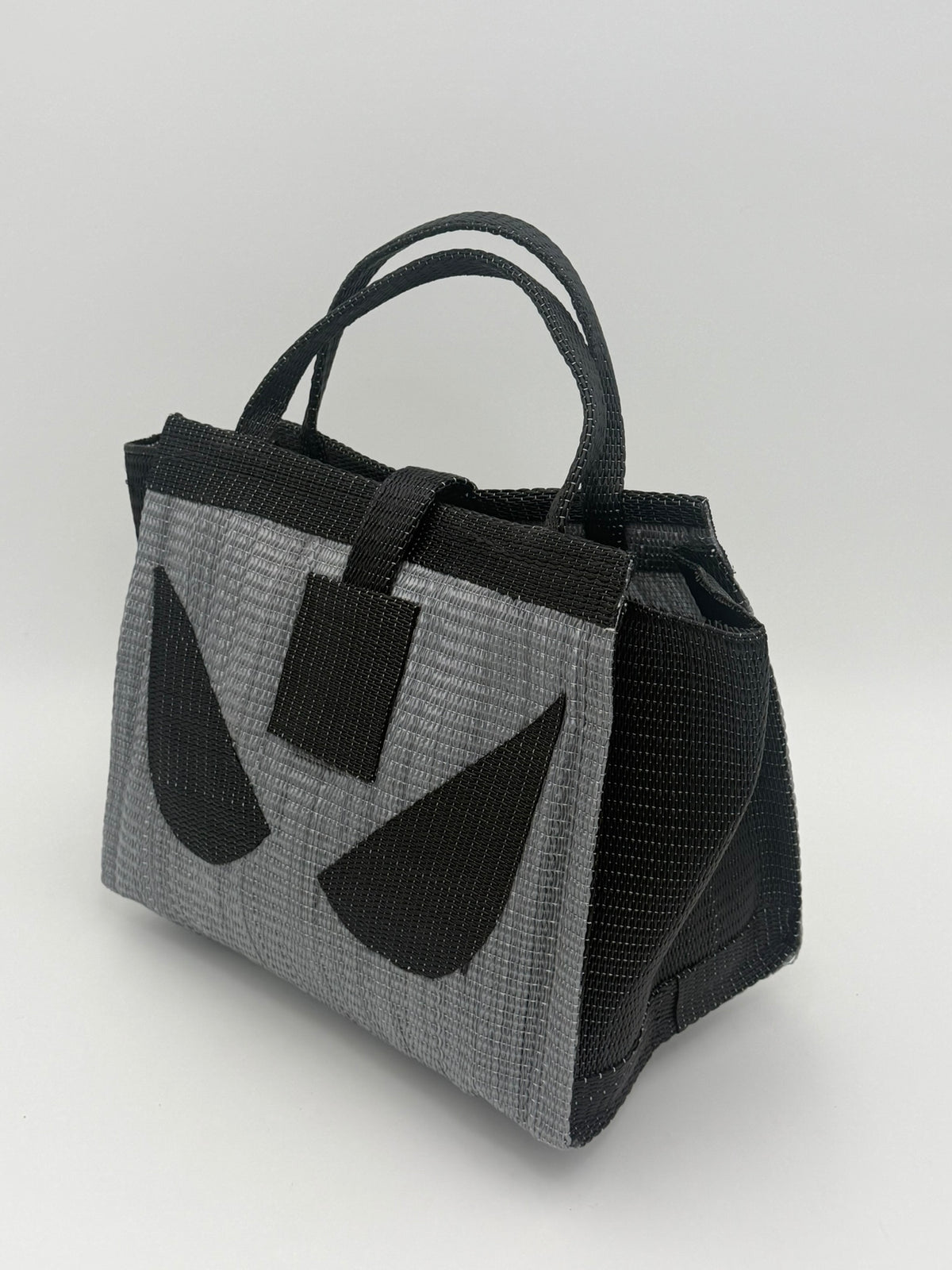 Silver Medium  handwoven tote bag by SCRUBIES in Gray,Black with Solid design and Leaf accent pattern