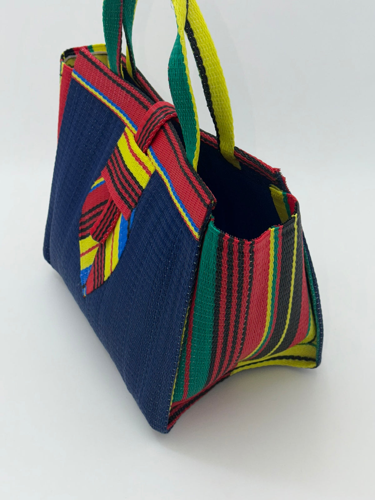 Berry Medium  handwoven tote bag by SCRUBIES in Blue,Red,Yellow,Green with Solid design and Leaf accent pattern