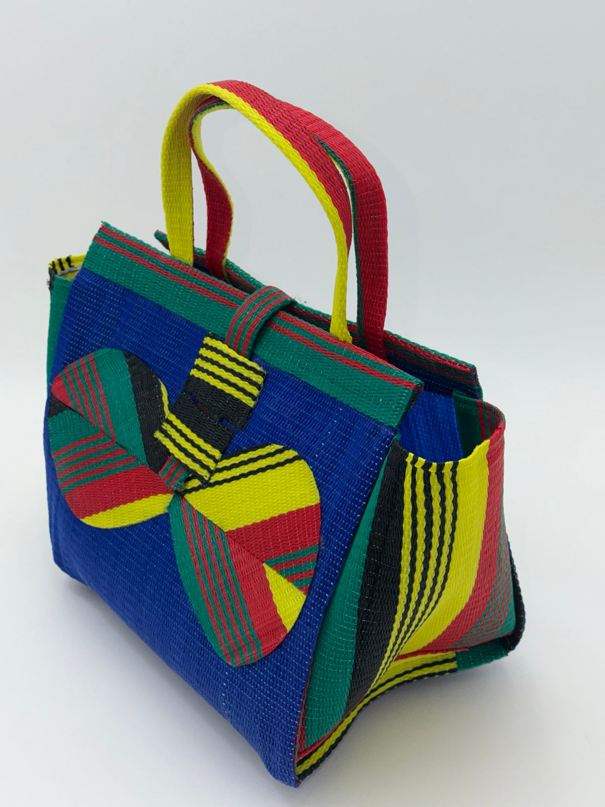 Berry Medium  handwoven tote bag by SCRUBIES in Blue,Red,Yellow,Green with Solid design and Bow accent pattern