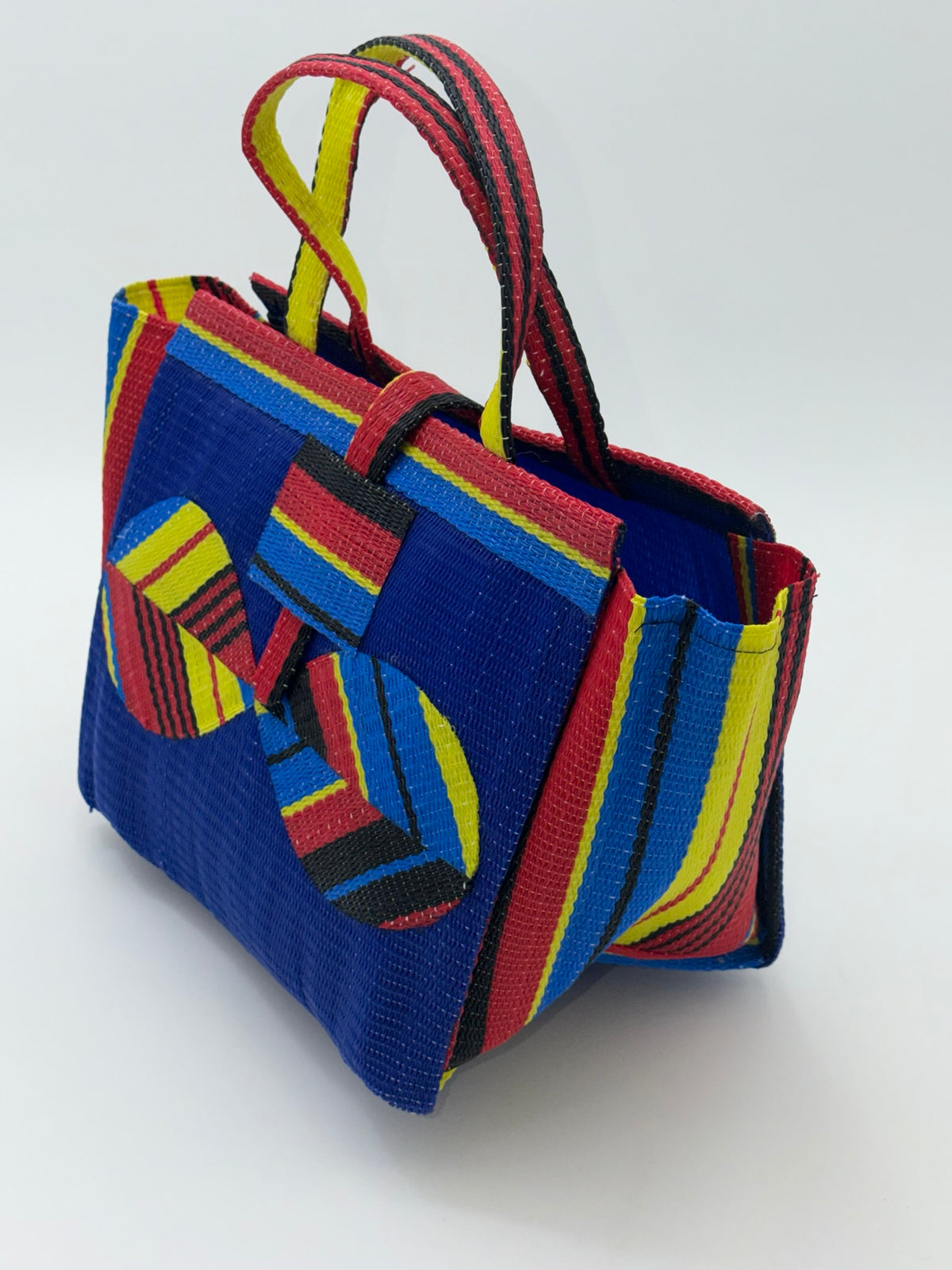 Berry Medium  handwoven tote bag by SCRUBIES in Blue,Red,Yellow,Black, with Solid design and Bow accent pattern