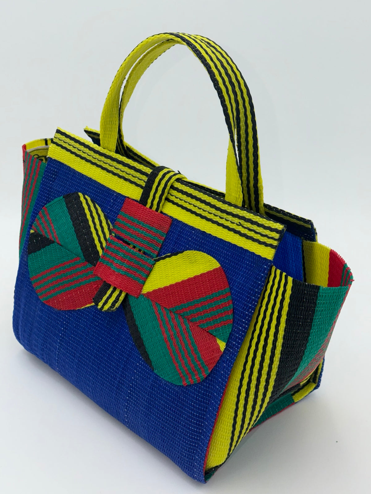 Berry Medium  handwoven tote bag by SCRUBIES in Blue,Red,Yellow,Black, with Solid design and Bow accent pattern