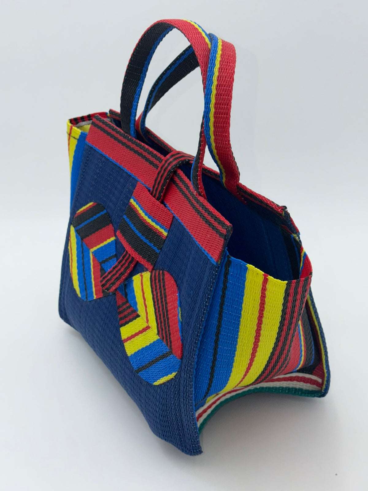 Berry Medium  handwoven tote bag by SCRUBIES in Blue,Red,Yellow,Black, with Solid design and Bow accent pattern