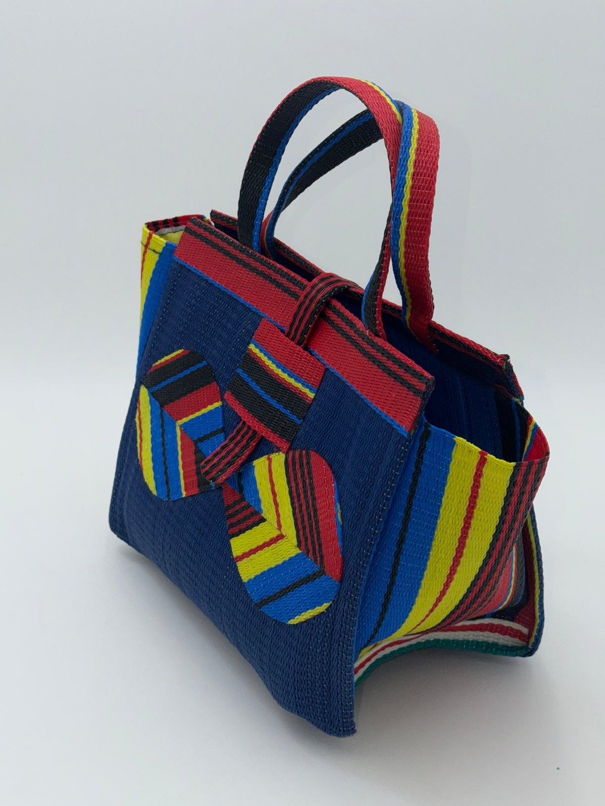 Berry Medium  handwoven tote bag by SCRUBIES in Blue,Red,Yellow,Black, with Solid design and Bow accent pattern