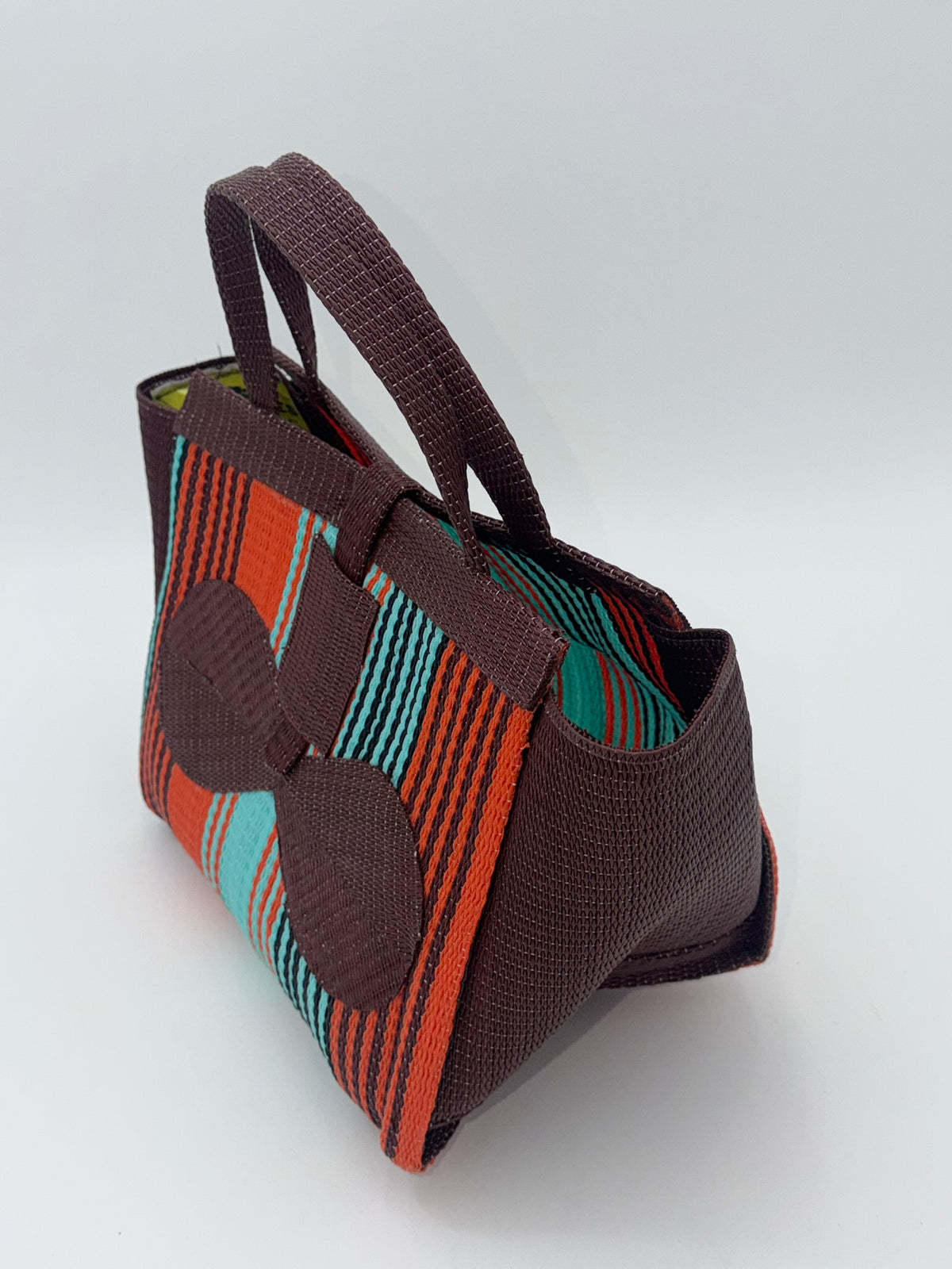 Brownie Medium  handwoven tote bag by SCRUBIES in Brown,Orange,Teal, with Stripes design and Bow accent pattern