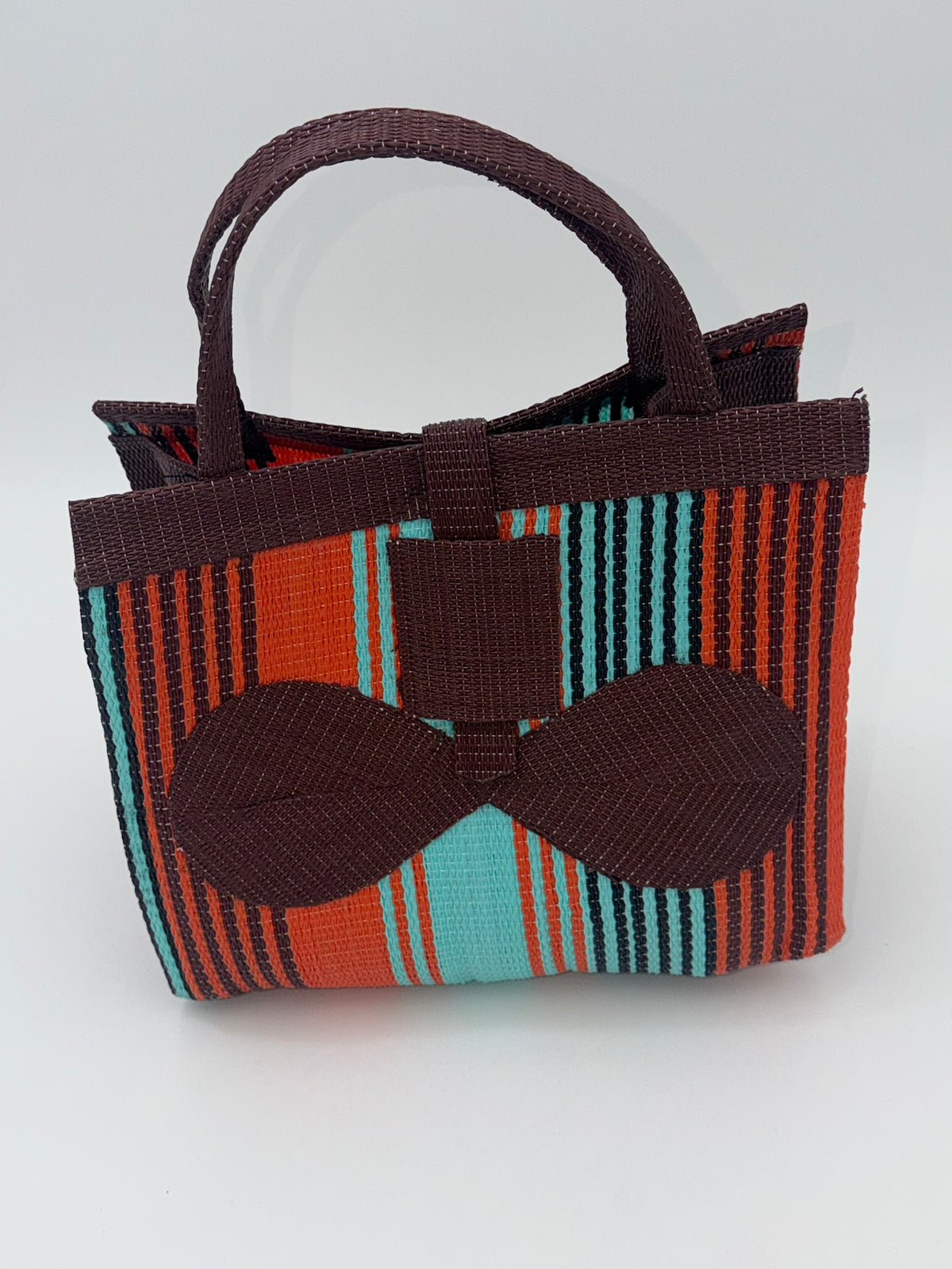 Brownie Medium  handwoven tote bag by SCRUBIES in Brown,Orange,Teal, with Stripes design and Bow accent pattern
