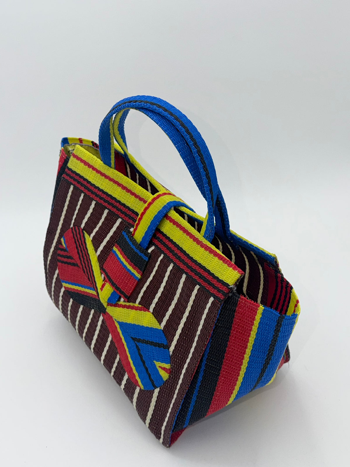 Brownie Medium  handwoven tote bag by SCRUBIES in Brown,Yellow,Red,Blue,Black with Stripes design and Bow accent pattern