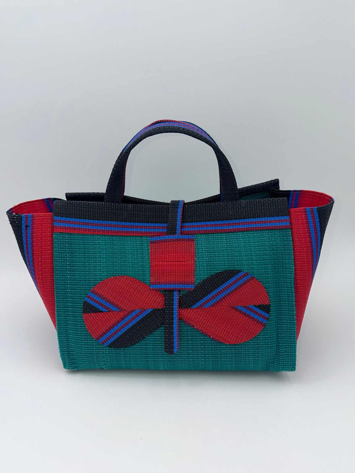 Emerald Large handwoven tote bag by SCRUBIES in Green,Red,Black,Blue with Solid design and Bow accent pattern