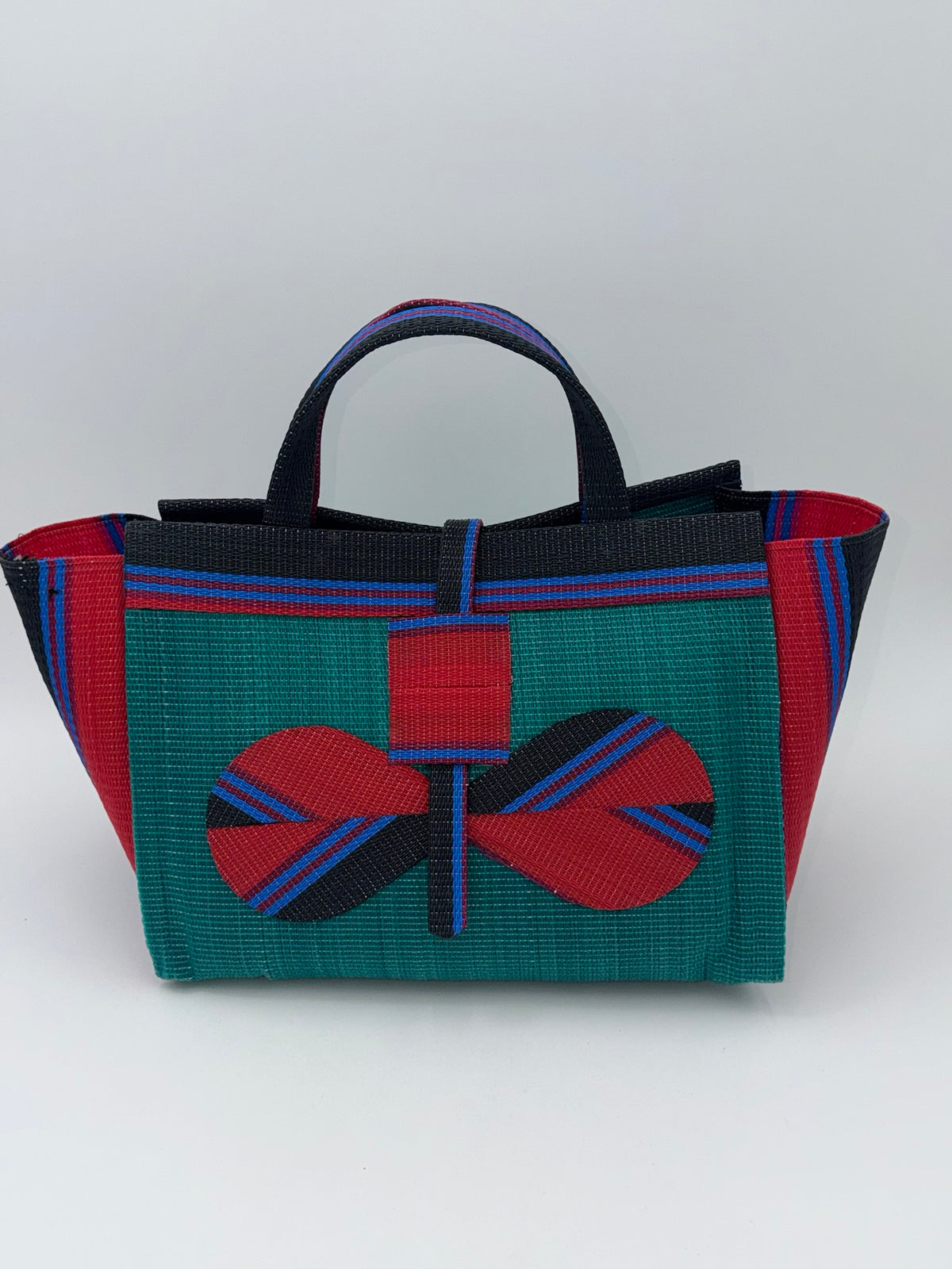 Emerald Large handwoven tote bag by SCRUBIES in Green,Red,Black,Blue with Solid design and Bow accent pattern