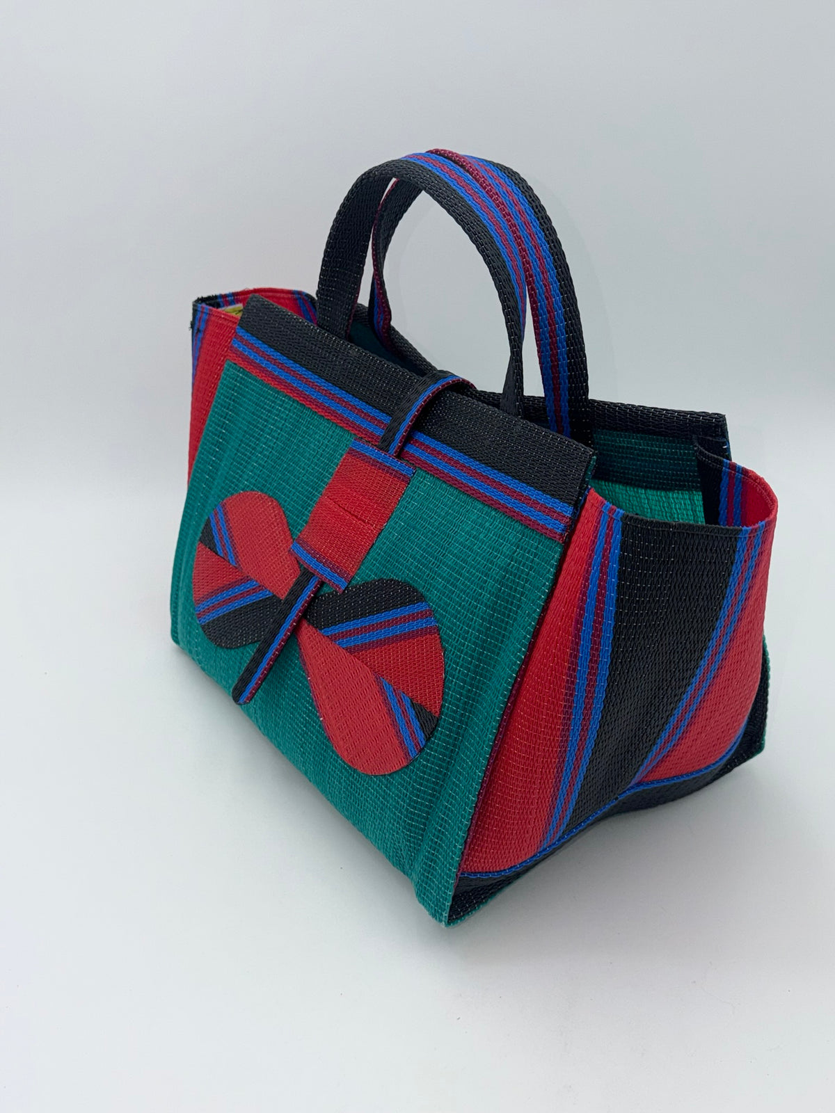 Emerald Large handwoven tote bag by SCRUBIES in Green,Red,Black,Blue with Solid design and Bow accent pattern