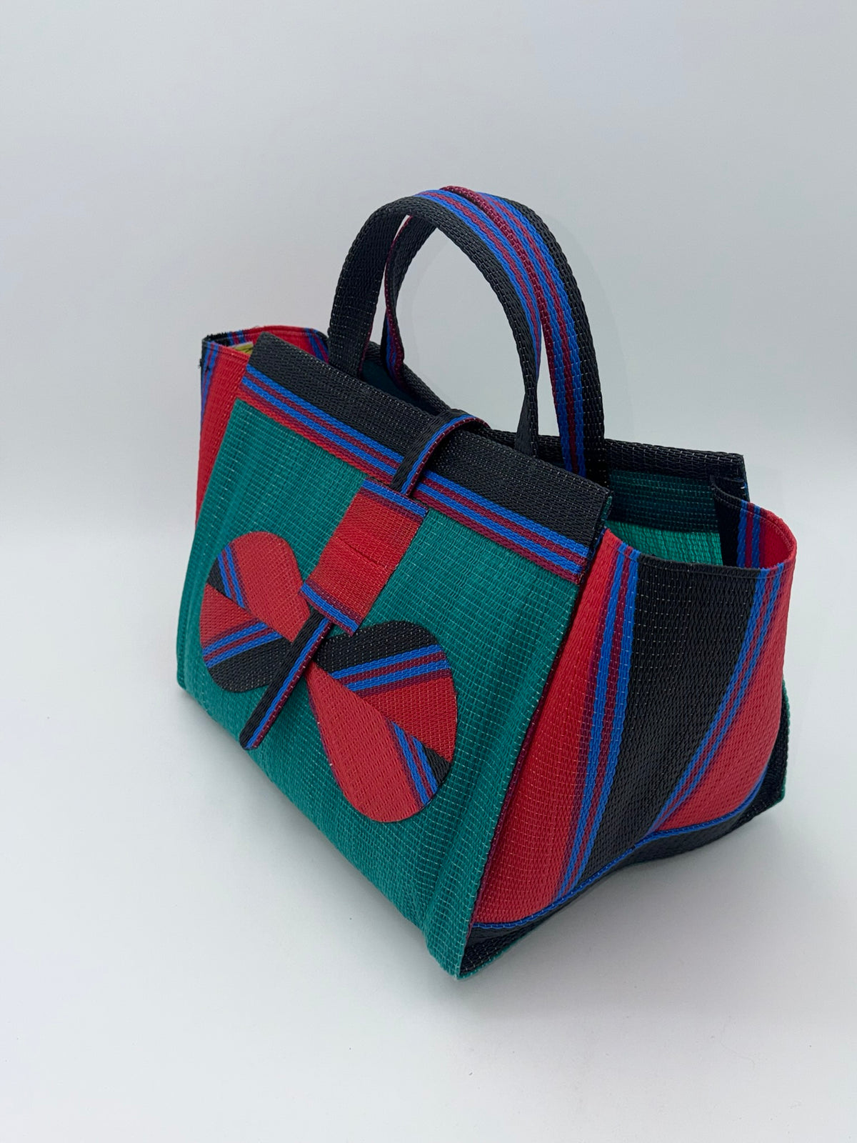 Emerald Large handwoven tote bag by SCRUBIES in Green,Red,Black,Blue with Solid design and Bow accent pattern
