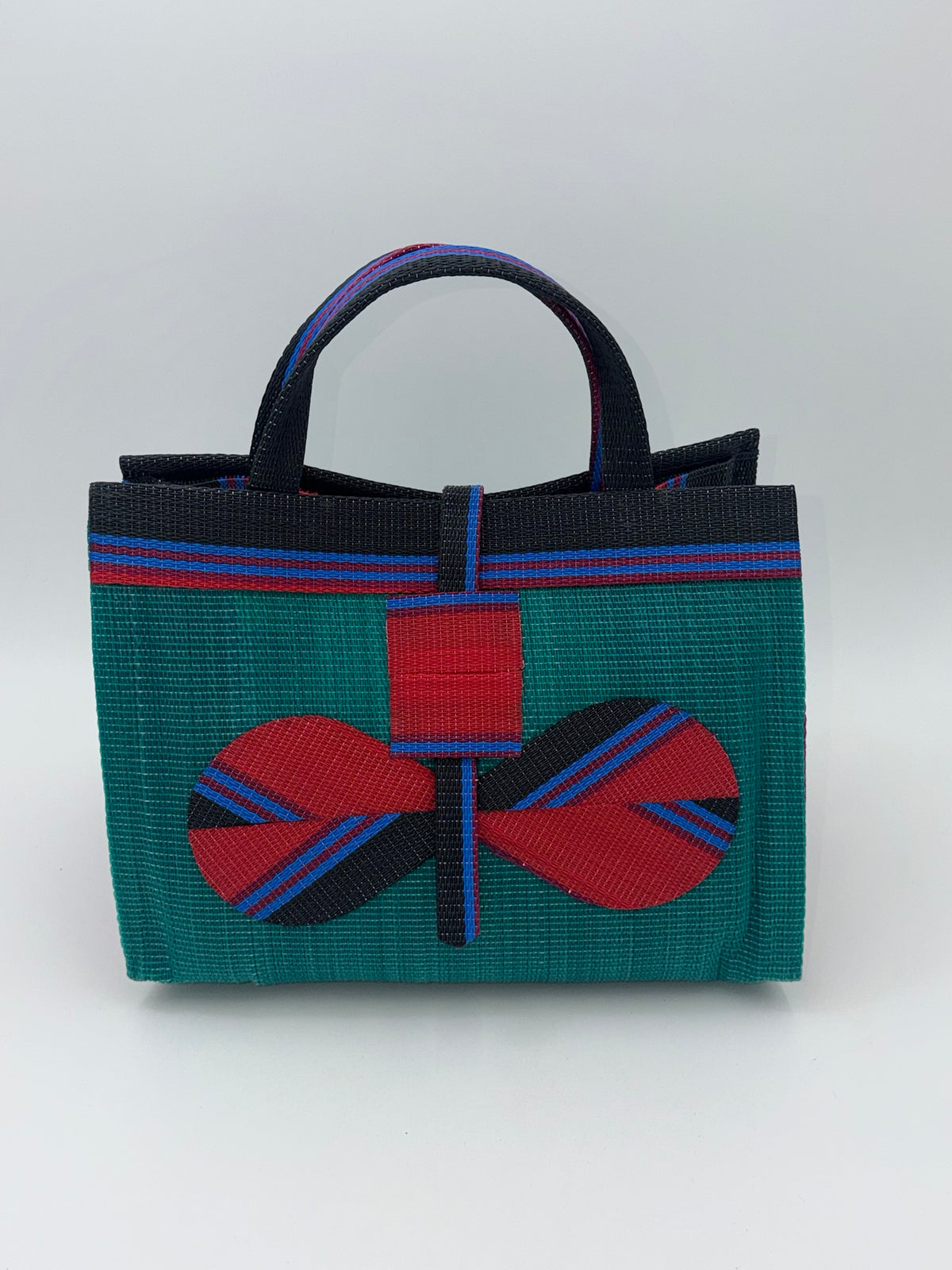 Emerald Large handwoven tote bag by SCRUBIES in Green,Red,Black,Blue with Solid design and Bow accent pattern